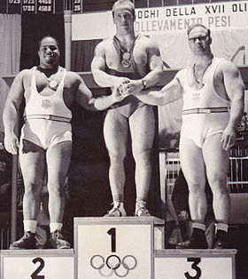 Norbert takes 3rd place at the 1960 Olympic games: A fantastic-looking Yuri Vlasov wins for Russia with America’s Jim Bradford in second place. Bradford lived and lifted in Washington, DC. He and my mentor Hugh “Huge” Cassidy would periodically train together. Bradford could clean and strict press 400 pounds. What a great trio. 
